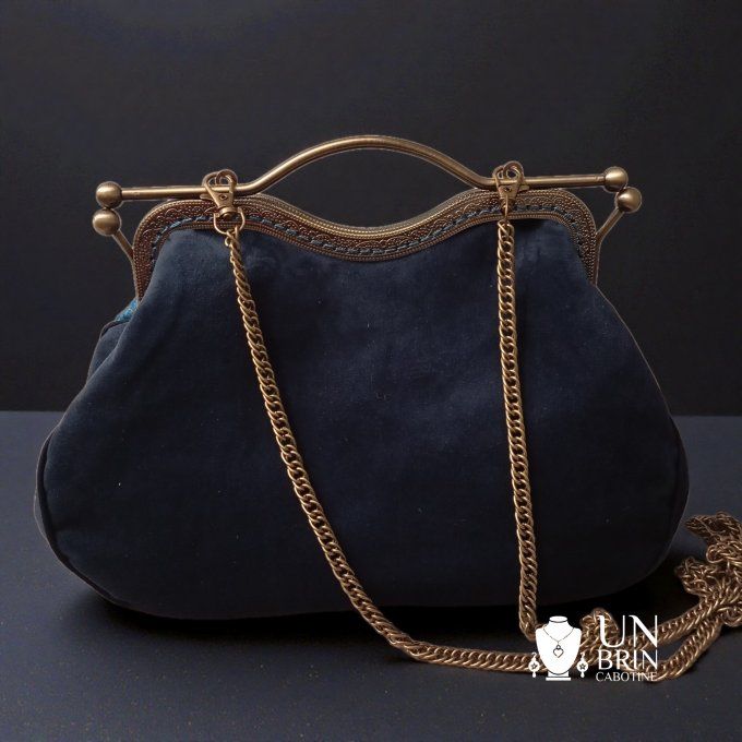 Un sac, un porte-monnaie et son bandeau "Nuit Solaire"