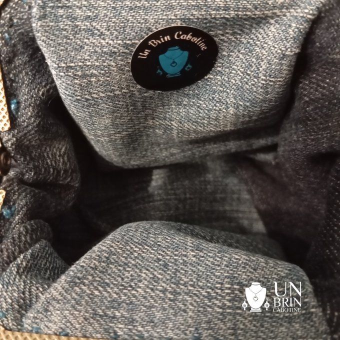Un sac, un porte-monnaie et son bandeau "Nuit Solaire"