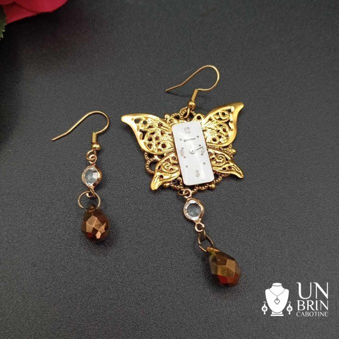 Boucles d'oreilles papillon asymétriques  