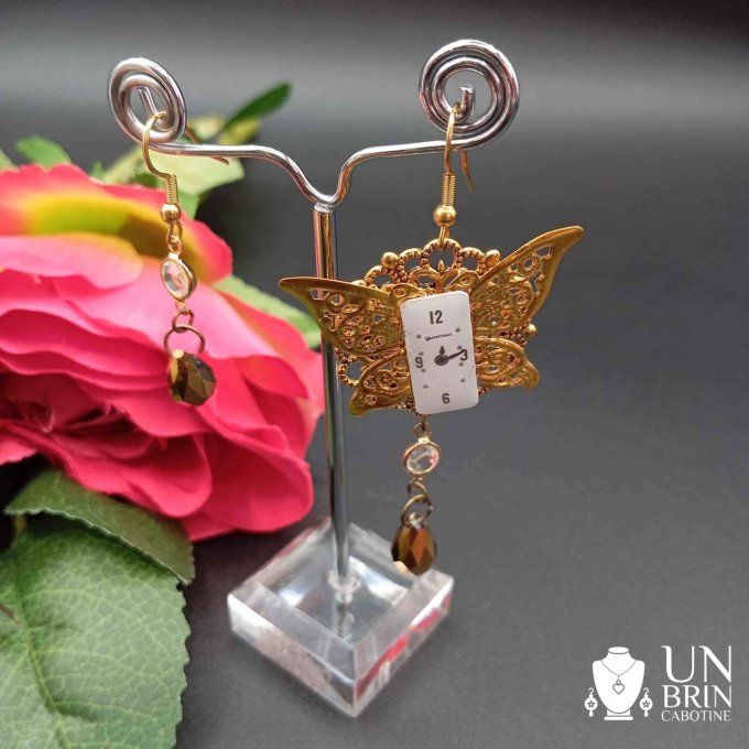 Boucles d'oreilles papillon asymétriques  